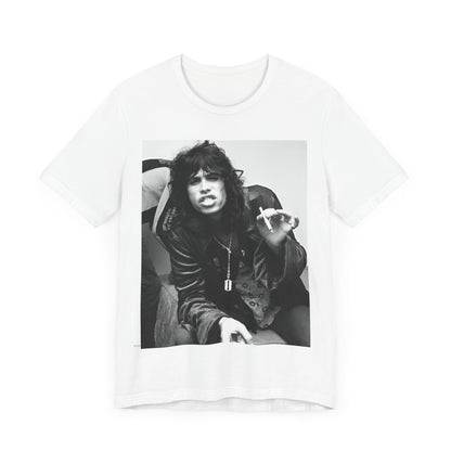 A black graphic t-shirt featuring a retro 70s photo of Aerosmith band members lounging in leather, exuding a cool, classic rock vibe.