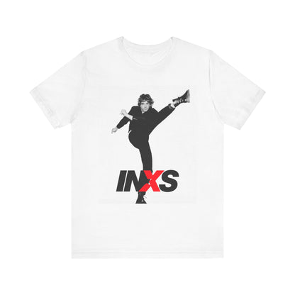 A black graphic t-shirt featuring a retro graphic related to INXS's 'Kick' album era.