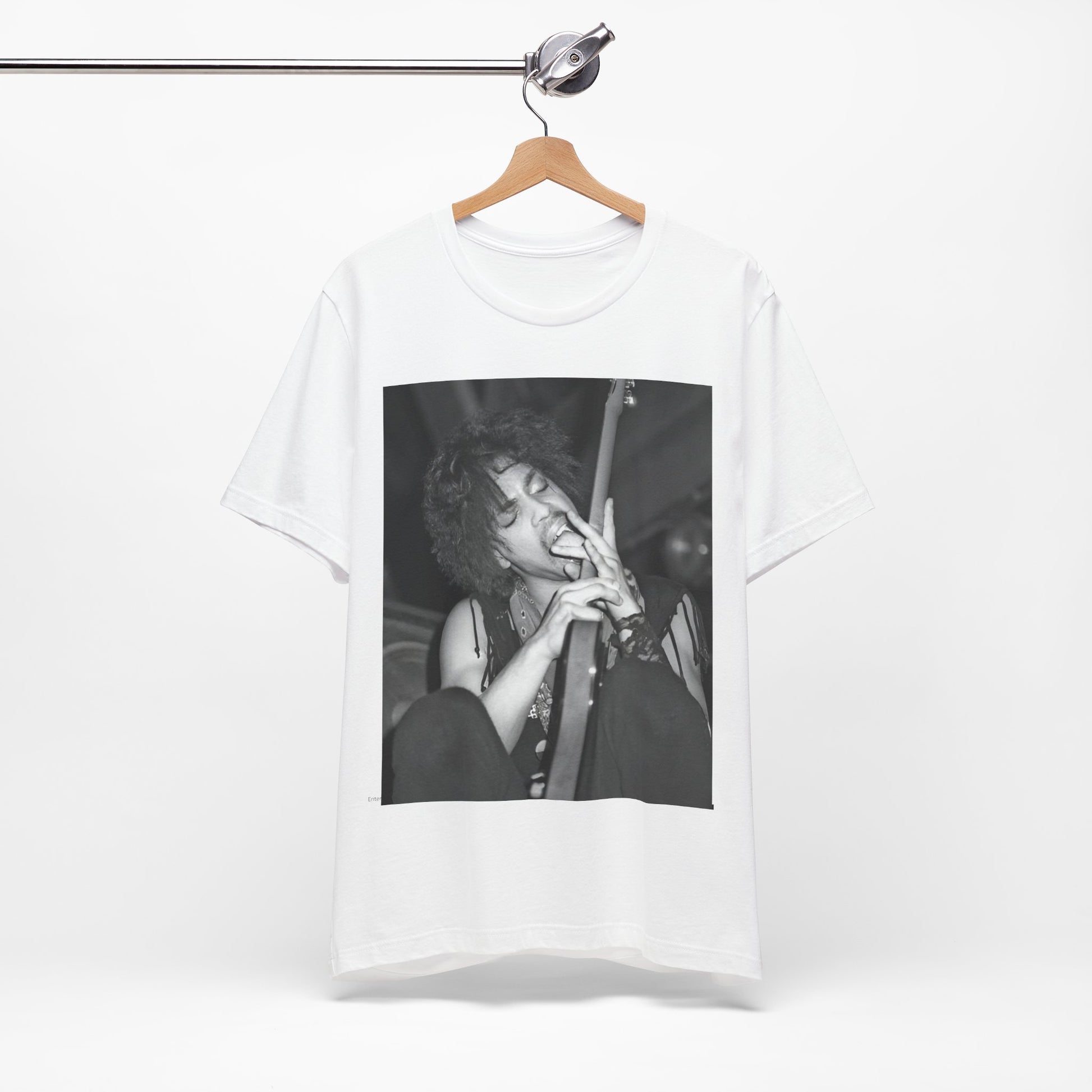 A black graphic t-shirt featuring a graphic or photo of Prince performing wildly on stage.