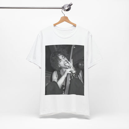 A black graphic t-shirt featuring a graphic or photo of Prince performing wildly on stage.