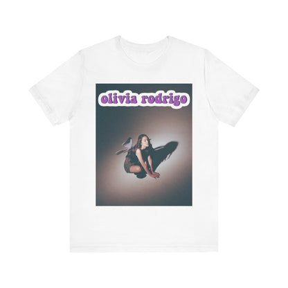 A black graphic t-shirt featuring a cool indie pop princess graphic of Olivia Rodrigo.