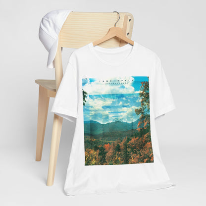 A black graphic t-shirt featuring a graphic related to Tame Impala's 'InnerSpeaker' album.