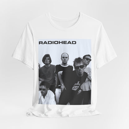 A black graphic t-shirt featuring a vintage 90s graphic related to Radiohead's 'Creep' song or era.