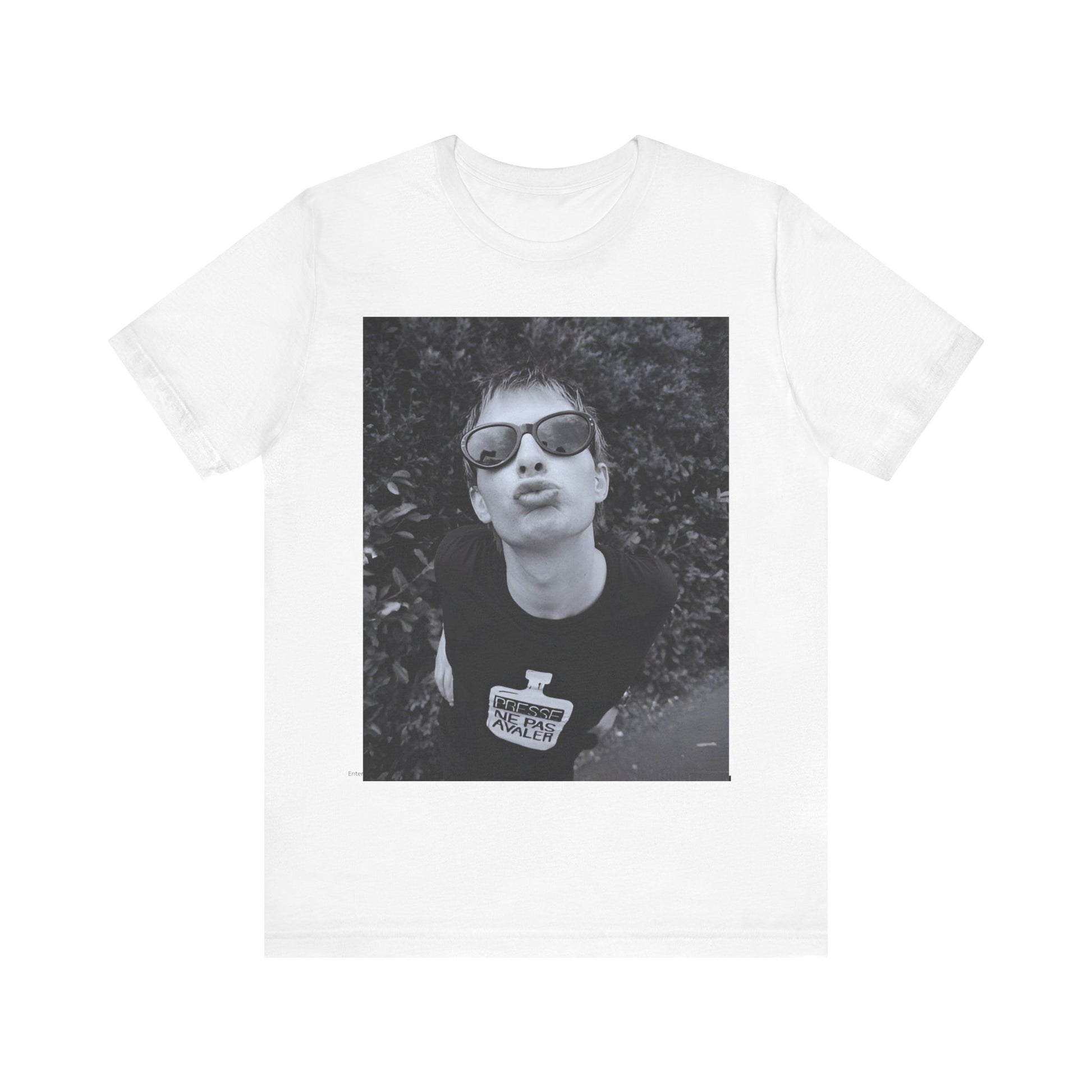A black graphic t-shirt featuring a retro 90s graphic of Thom Yorke from Radiohead.