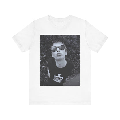 A black graphic t-shirt featuring a retro 90s graphic of Thom Yorke from Radiohead.