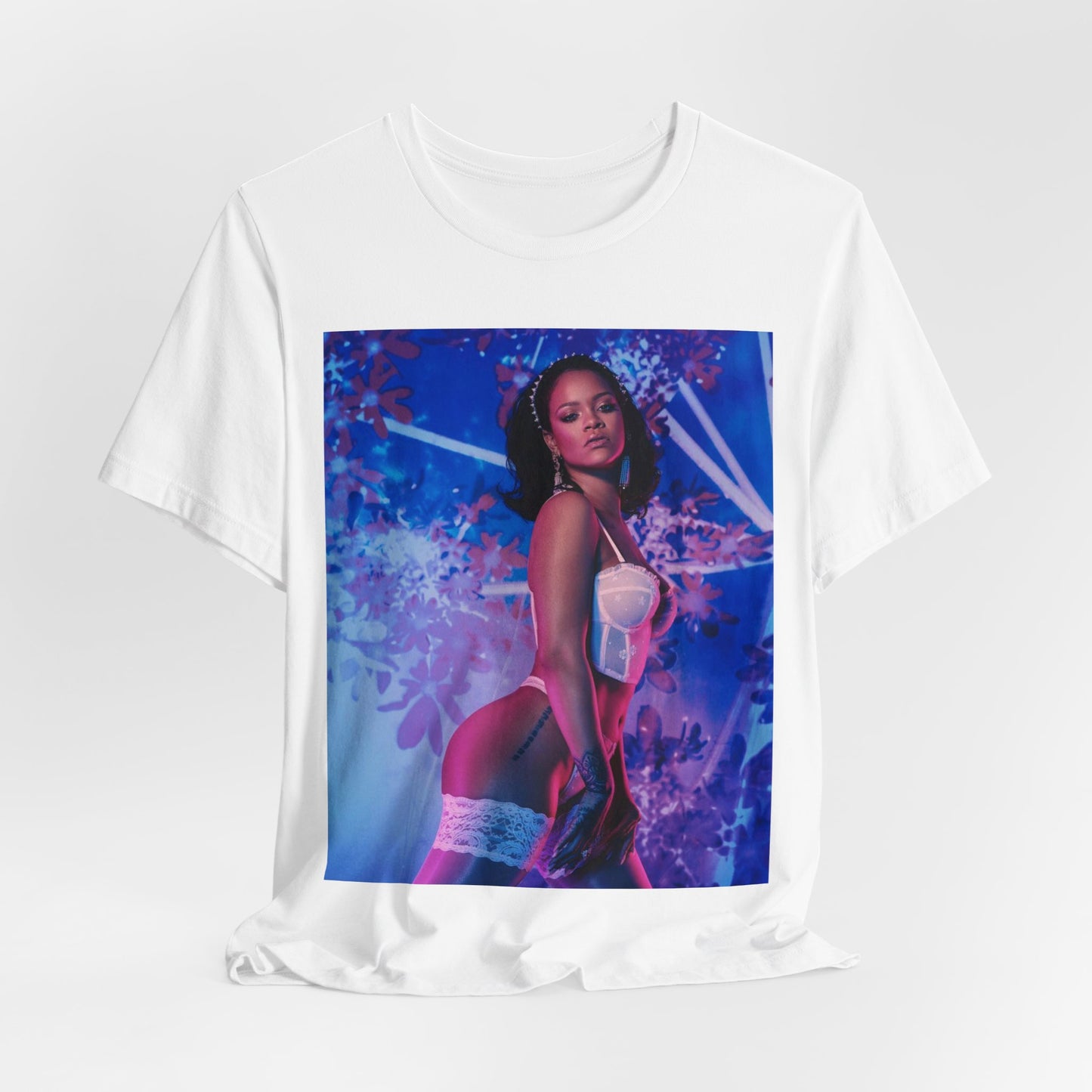 A black graphic t-shirt featuring a graphic of Rihanna as a lingerie goddess.