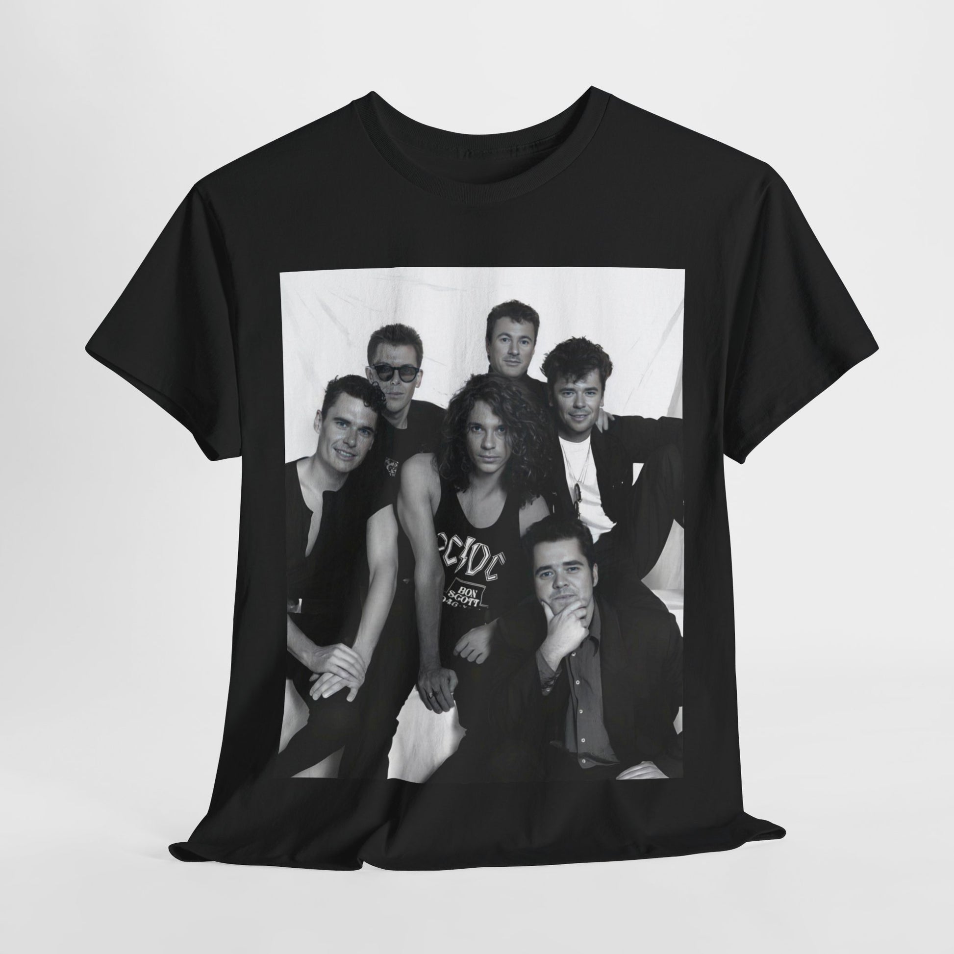 A black graphic t-shirt featuring an 80s rock aesthetic graphic of INXS.
