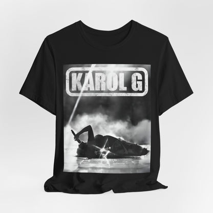 A black graphic t-shirt featuring a black and white graphic or photo of Karol G performing live on stage.