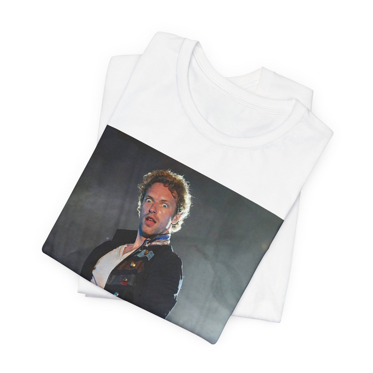 A black graphic t-shirt featuring a vintage graphic of Coldplay performing live acoustically.