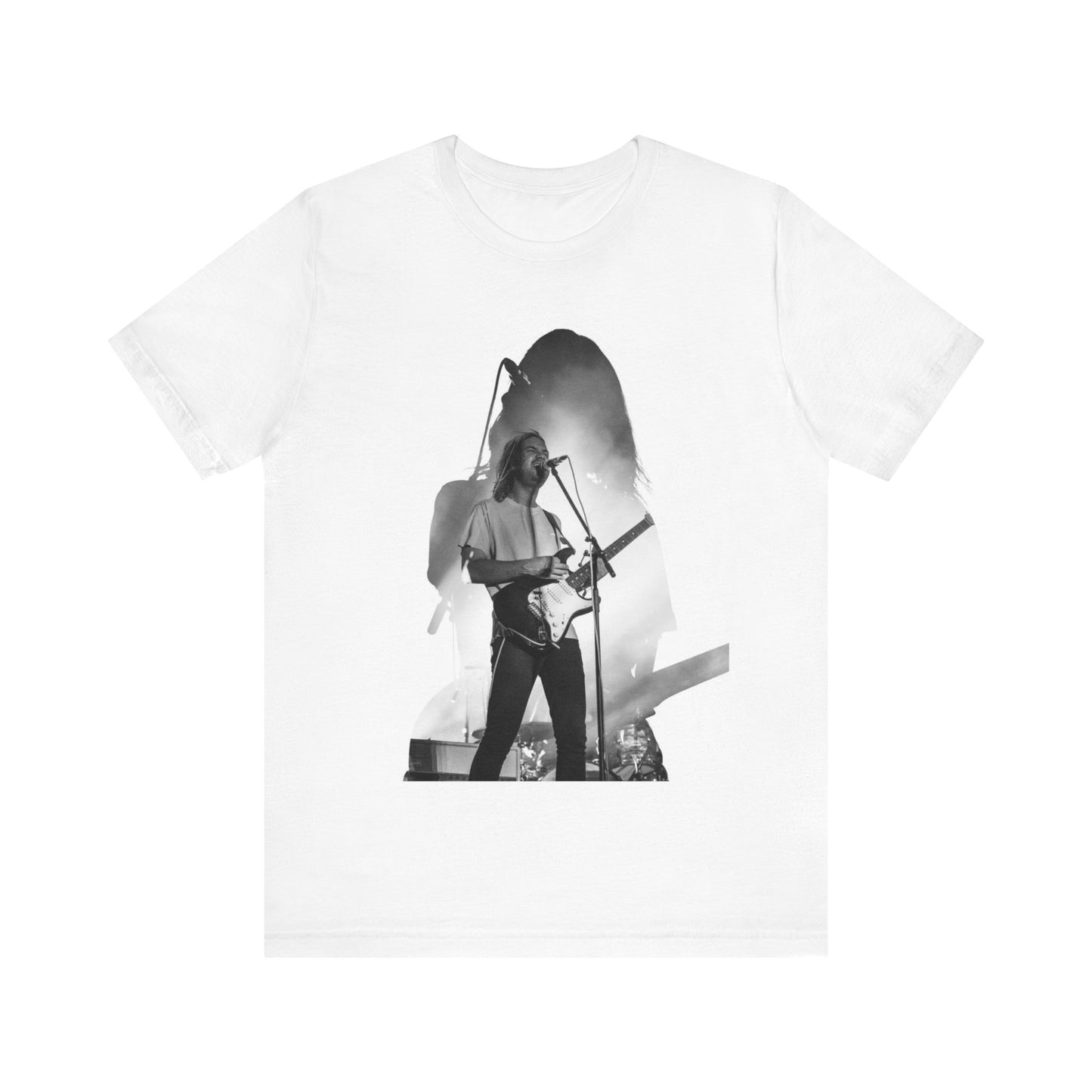 A black graphic t-shirt featuring a black and white, monochrome graphic or photo of Tame Impala.