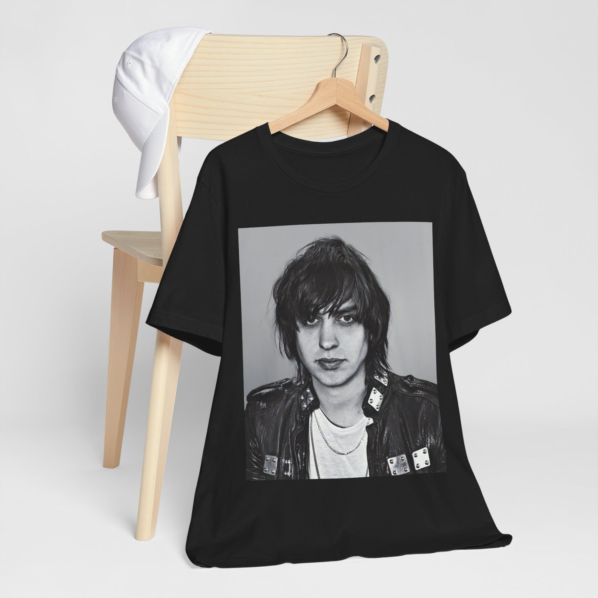 A black graphic t-shirt featuring a portrait photo of Julian Casablancas from The Strokes.