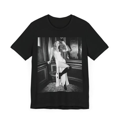 A black graphic t-shirt featuring a retro black and white monochrome graphic or photo of Shakira.