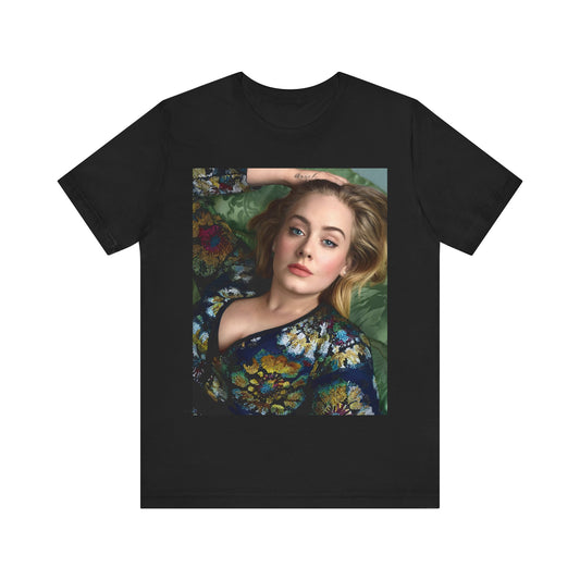 A black graphic t-shirt featuring a photo of Adele, possibly with floral elements or a floral background, showing a serene or contemplative expression.