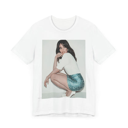 A black graphic t-shirt featuring a stylized graphic of Camila Cabello as a Latin pop princess.