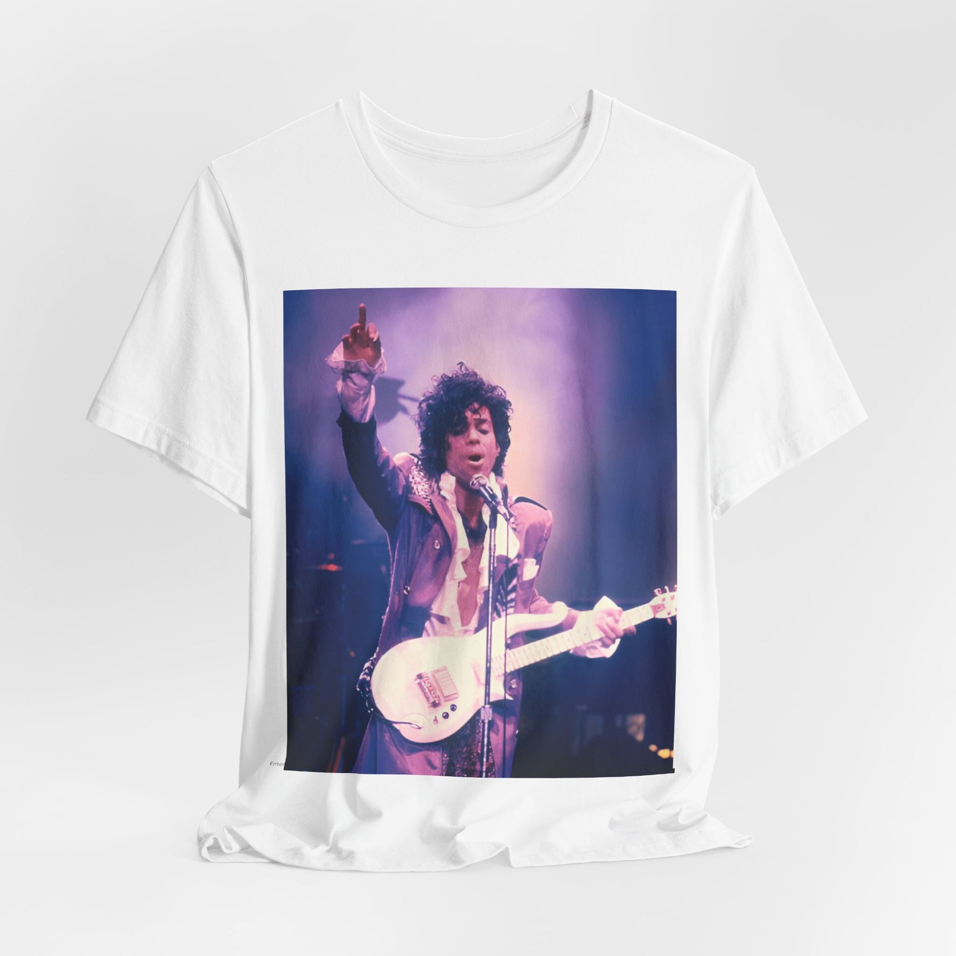 A black graphic t-shirt featuring a boxy graphic with a 'Purple Rain' vibe related to Prince.