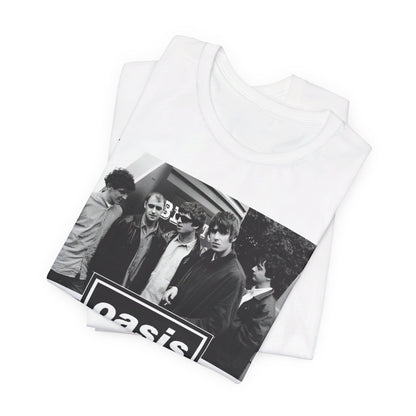 A black graphic t-shirt featuring an early days band photo graphic of Oasis.