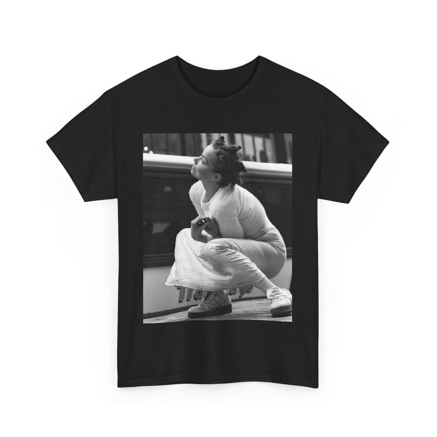 A black graphic t-shirt featuring a graphic of Bjork as an experimental pop icon.