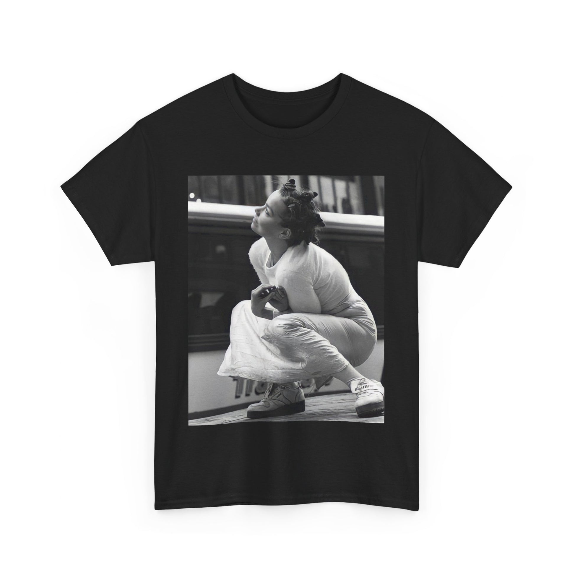 A black graphic t-shirt featuring a graphic of Bjork as an experimental pop icon.
