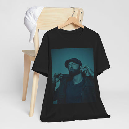 A black graphic t-shirt featuring a graphic of Eminem as a 'Rap God'.