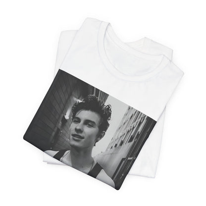 A black graphic t-shirt featuring a vintage black and white portrait graphic or photo of Shawn Mendes.