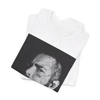 A black graphic t-shirt featuring a black and white portrait graphic of Post Malone.