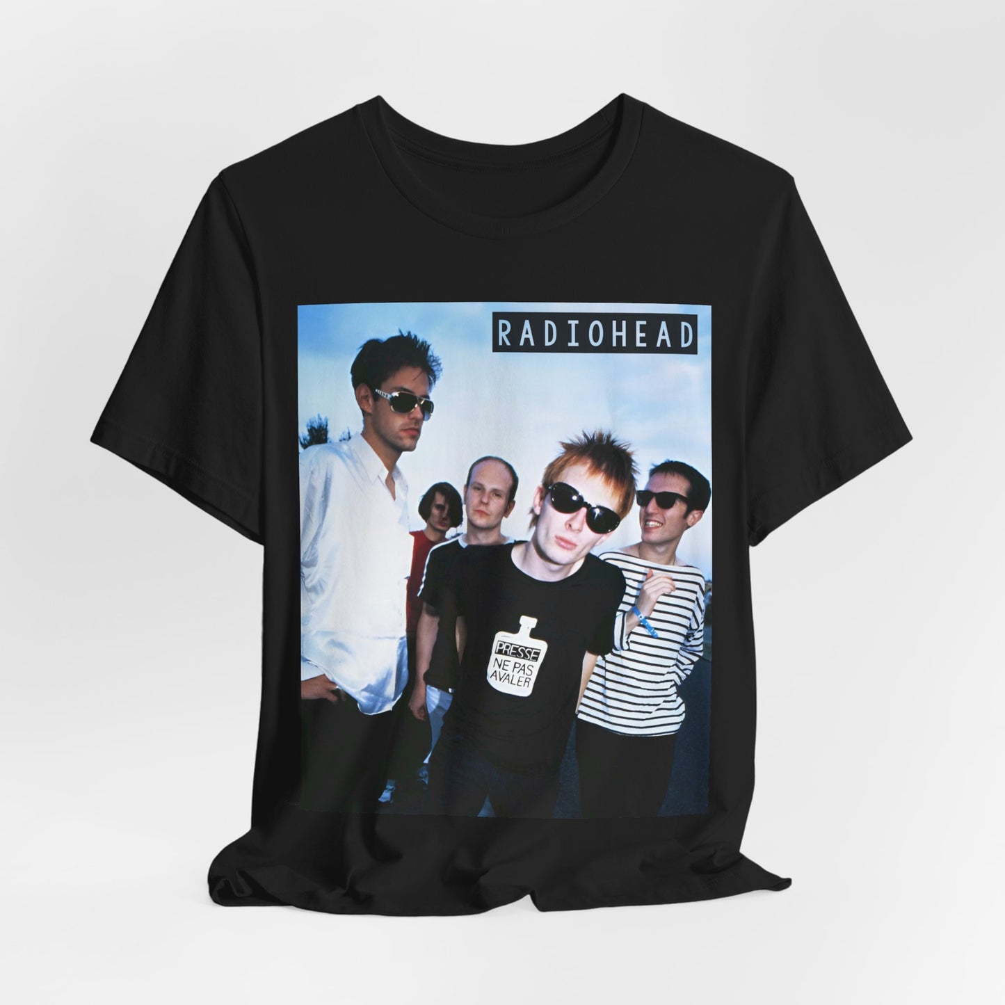 A black graphic t-shirt featuring a vintage alt rock graphic of Radiohead.