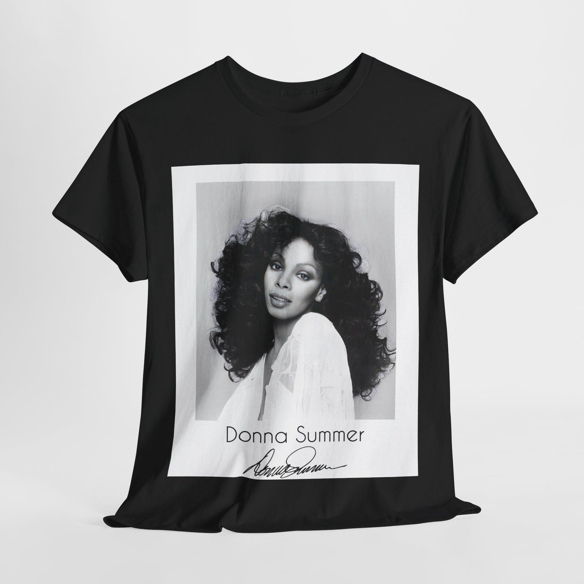 A black graphic t-shirt featuring a portrait of Donna Summer, possibly with her signature or iconic elements.