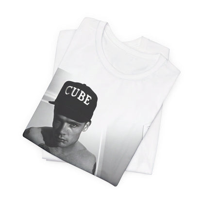 A black graphic t-shirt featuring a black and white graphic or photo of Flea from Red Hot Chili Peppers performing live on stage.