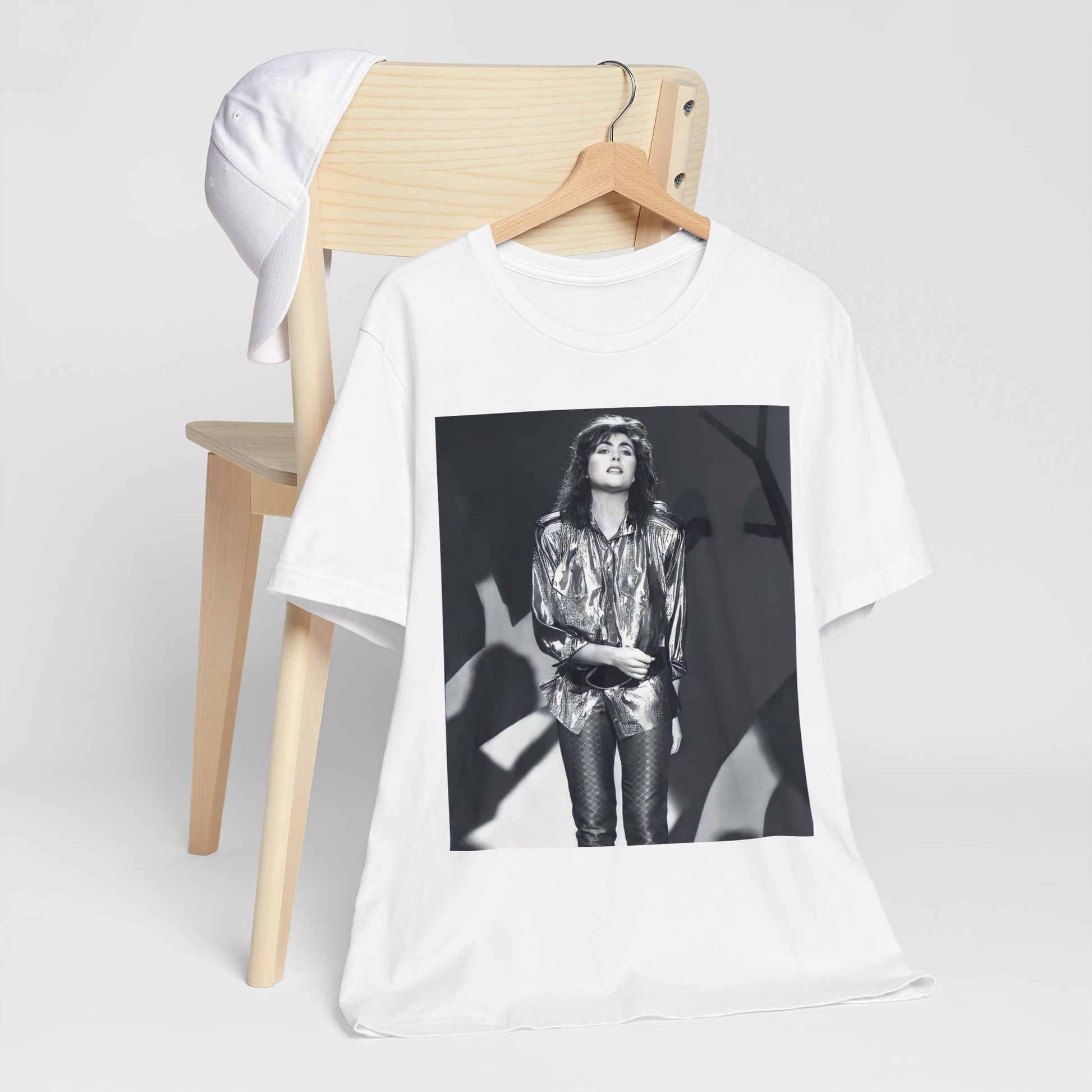 A black graphic t-shirt featuring a graphic of Laura Branigan emphasizing her timeless voice.