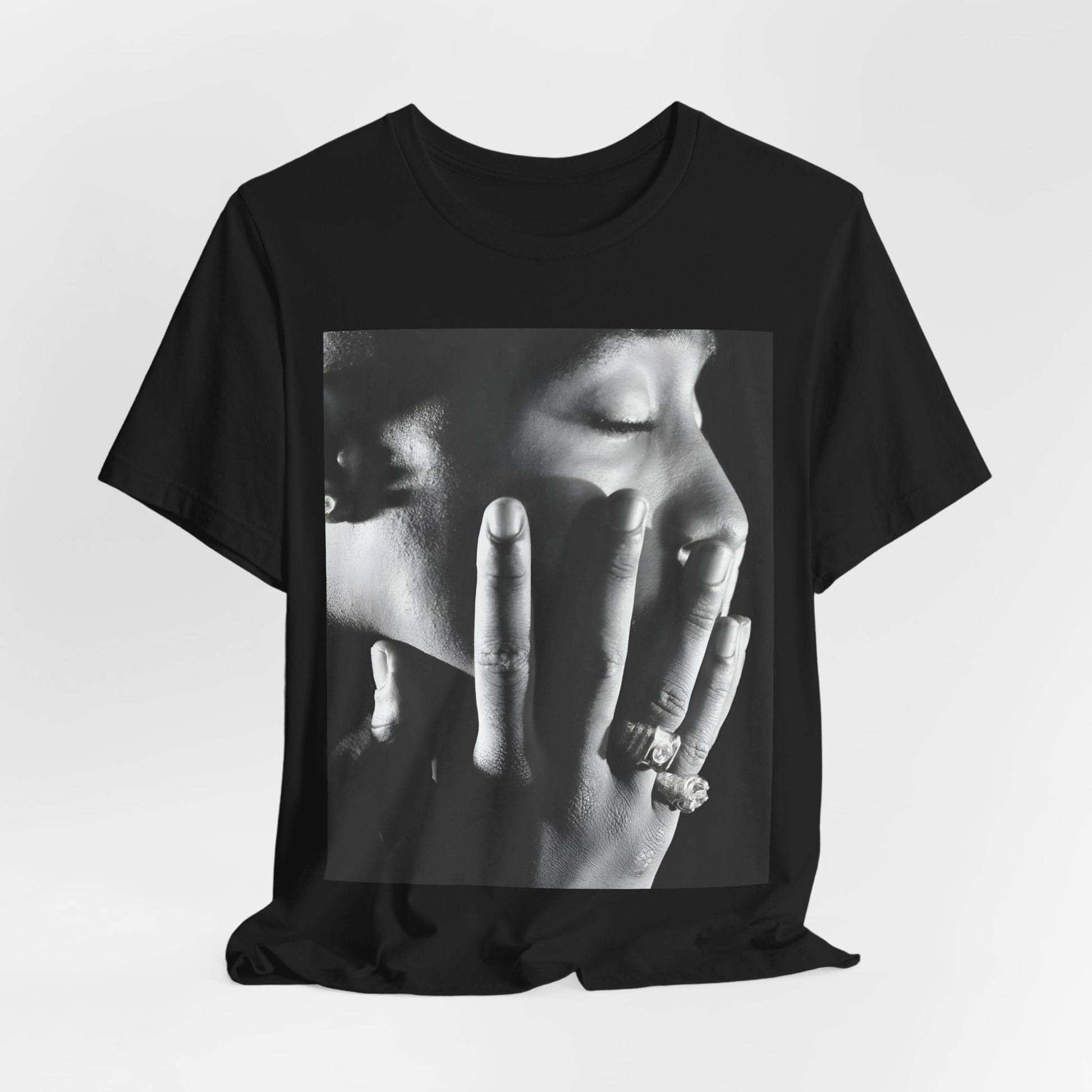 A black graphic t-shirt featuring an iconic West Coast swag graphic of Tupac.