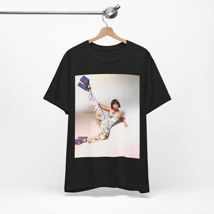 A black graphic t-shirt featuring a graphic of Nicki Minaj as a global fashion rap queen.