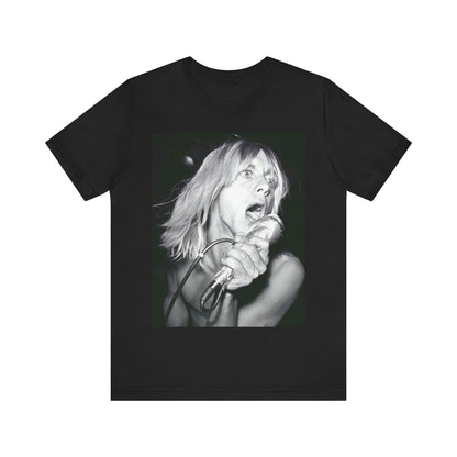 A black graphic t-shirt featuring a graphic of Iggy Pop as the Godfather of Punk, performing live.