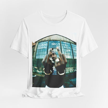 A black graphic t-shirt featuring a graphic of Tupac giving the middle finger.