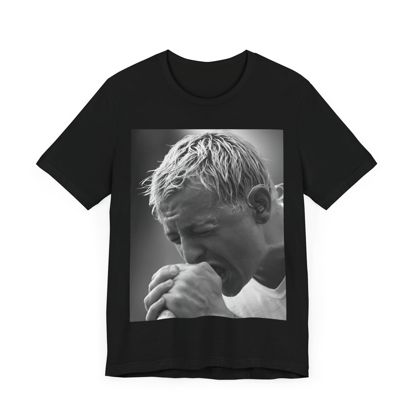 A black graphic t-shirt featuring a graphic or photo of Chester Bennington from Linkin Park performing live on stage.