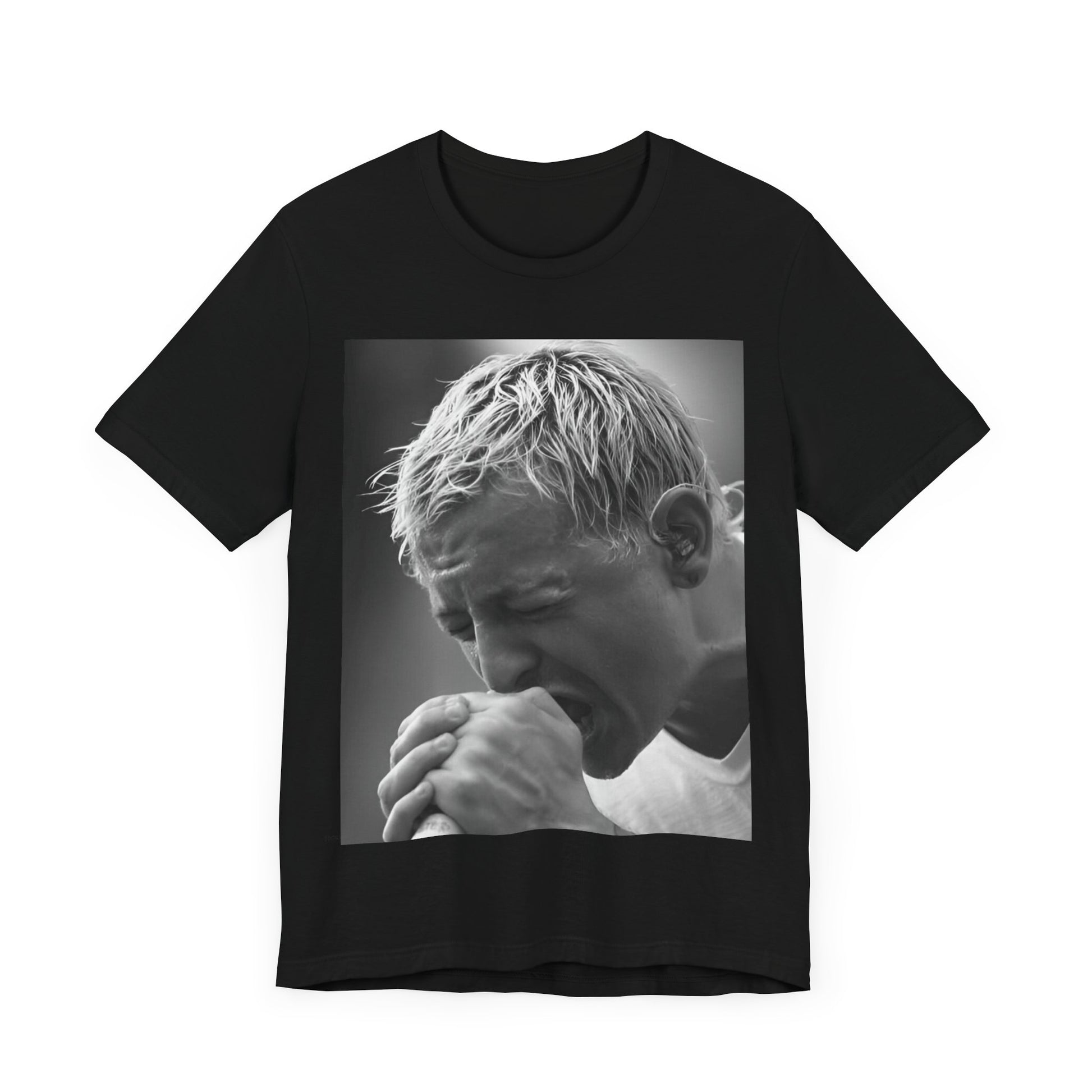 A black graphic t-shirt featuring a graphic or photo of Chester Bennington from Linkin Park performing live on stage.
