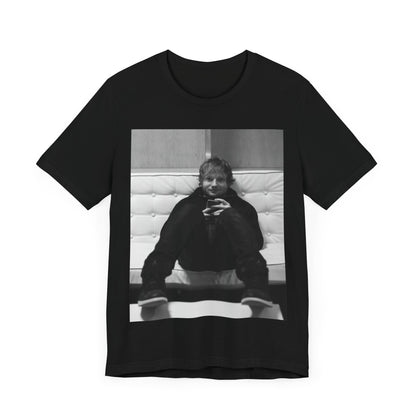 A black graphic t-shirt featuring a bold black and white graphic of Ed Sheeran.