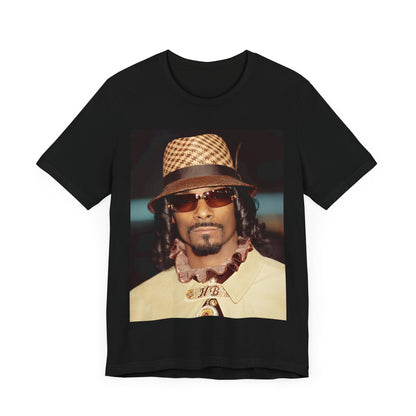 A black graphic t-shirt featuring a glamorous graphic of Snoop Dogg as a Doggfather icon.