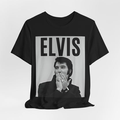 A black graphic t-shirt featuring a retro graphic of Elvis Presley as a 'Rebel With A Cause.'