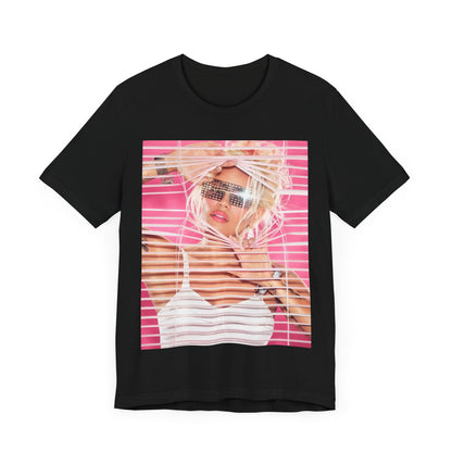 A black graphic t-shirt featuring a graphic of Karol G in a cool Latin trap style.