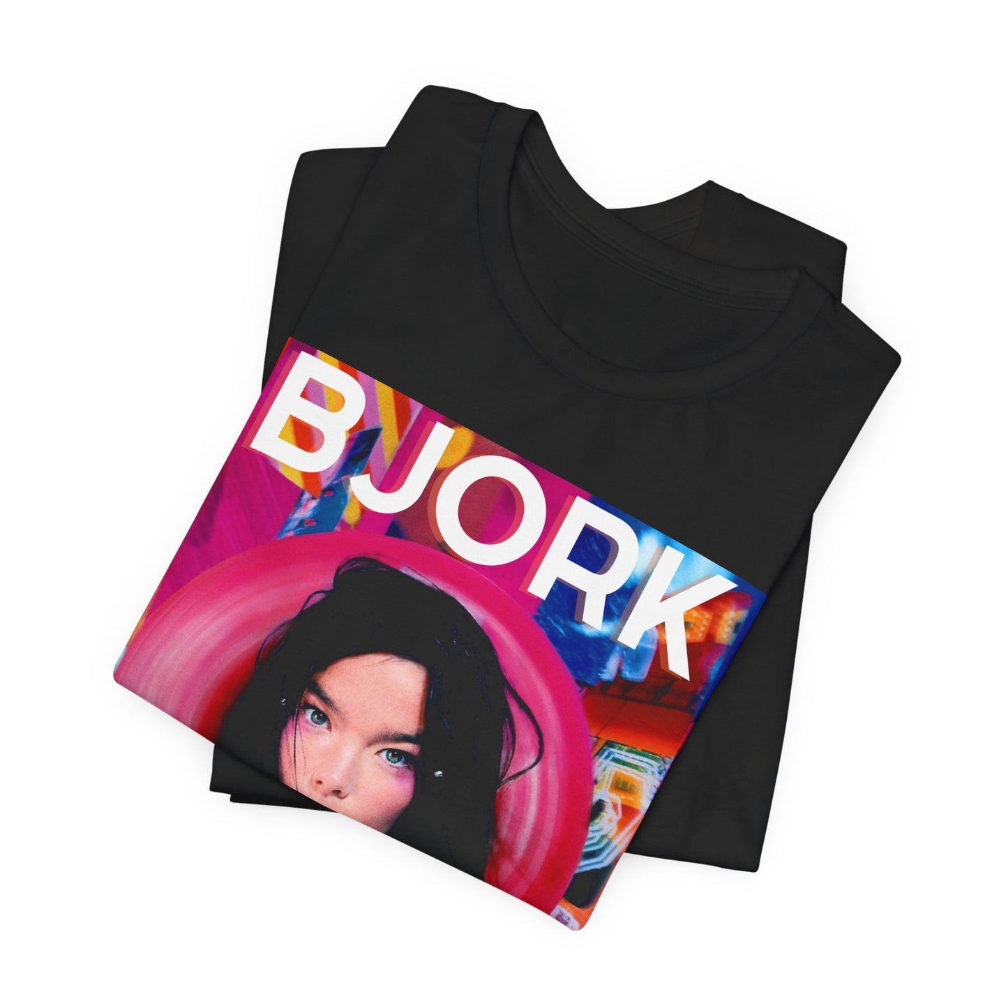 A black graphic t-shirt featuring an artistic or aesthetic pop art graphic of Bjork, with vibrant colors or bold lines.