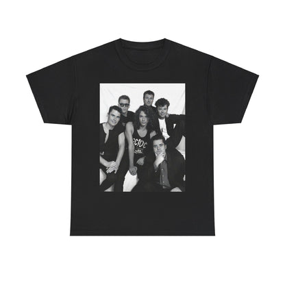 A black graphic t-shirt featuring an 80s rock aesthetic graphic of INXS.