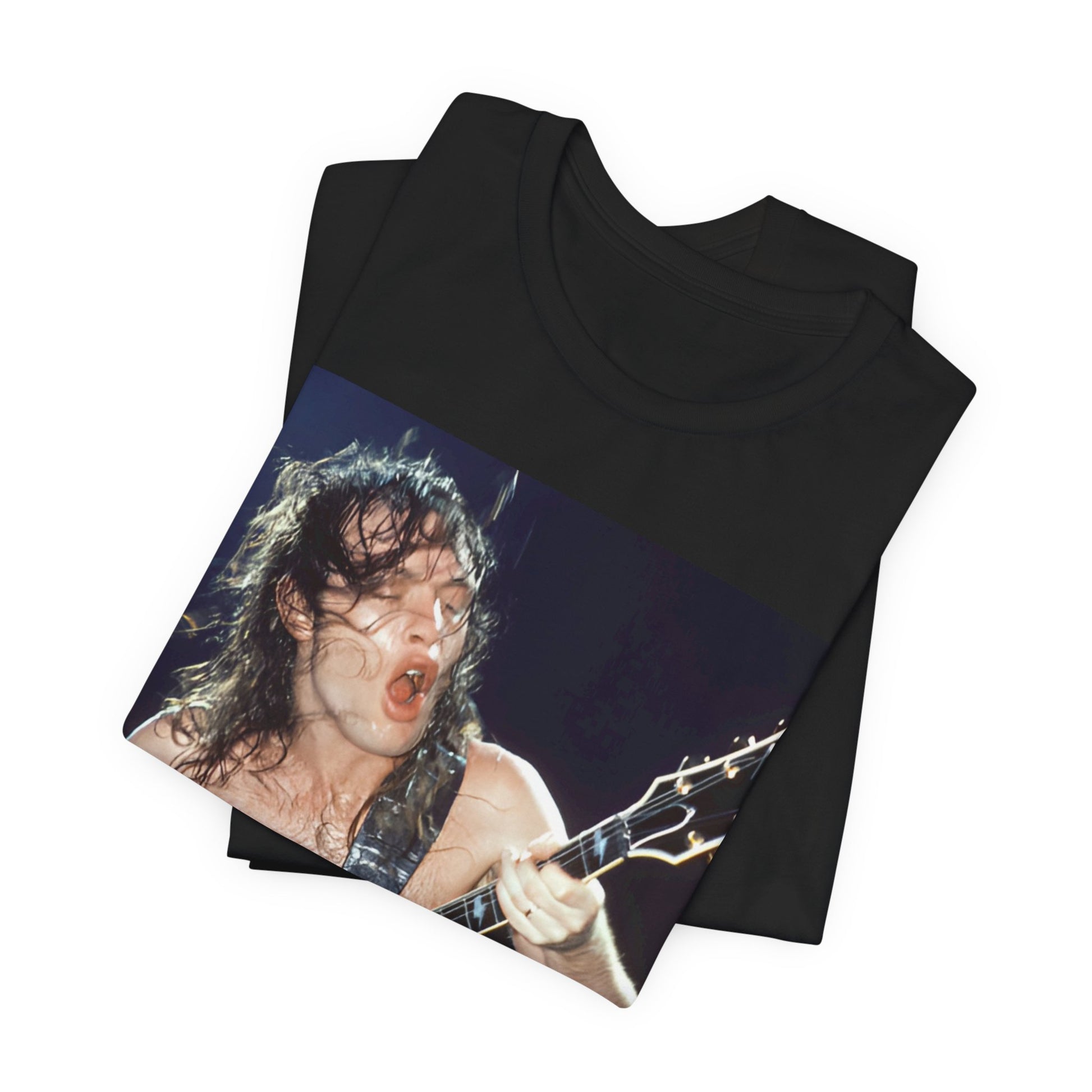 A graphic of AC/DC's lead guitarist, Angus Young, performing with high energy live on stage, printed on a t-shirt.