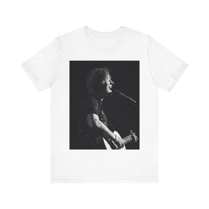 A black graphic t-shirt featuring a graphic related to Ed Sheeran's stadium tour.