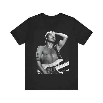 A black graphic t-shirt featuring a graphic or photo of Sting performing live on stage in 1983.
