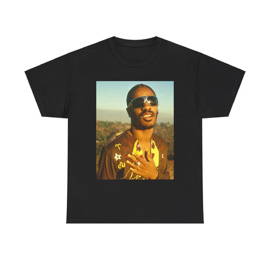 A black graphic t-shirt featuring a 70s cool musical genius graphic of Stevie Wonder.