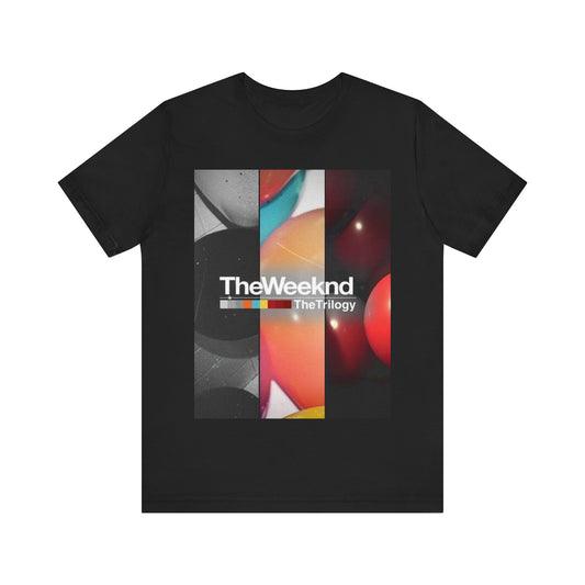 A black graphic t-shirt featuring a graphic related to The Weeknd's 'The Trilogy' album.