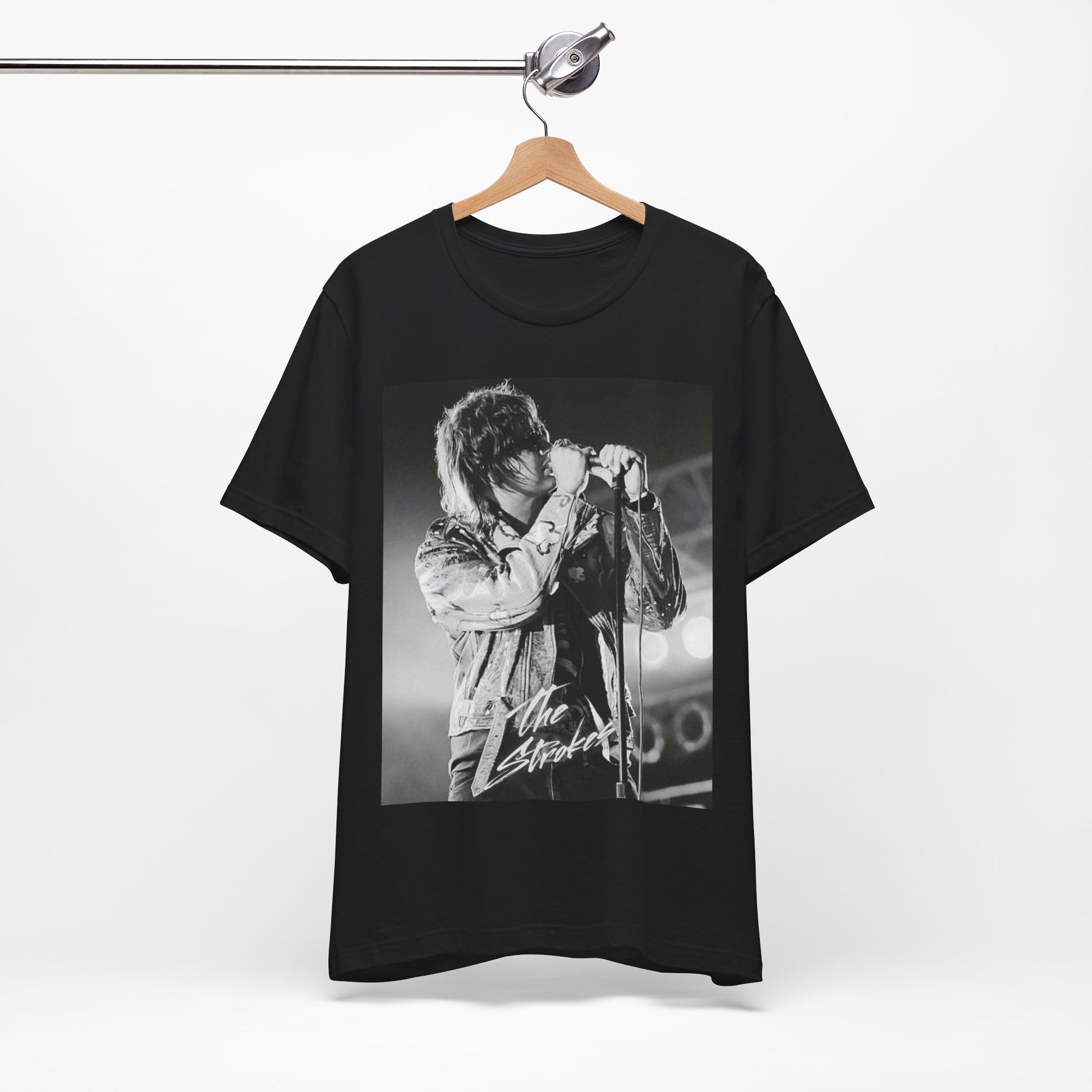 A black graphic t-shirt featuring a vintage graphic related to The Strokes' 'Last Nite' song or era.