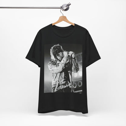 A black graphic t-shirt featuring a vintage graphic related to The Strokes' 'Last Nite' song or era.