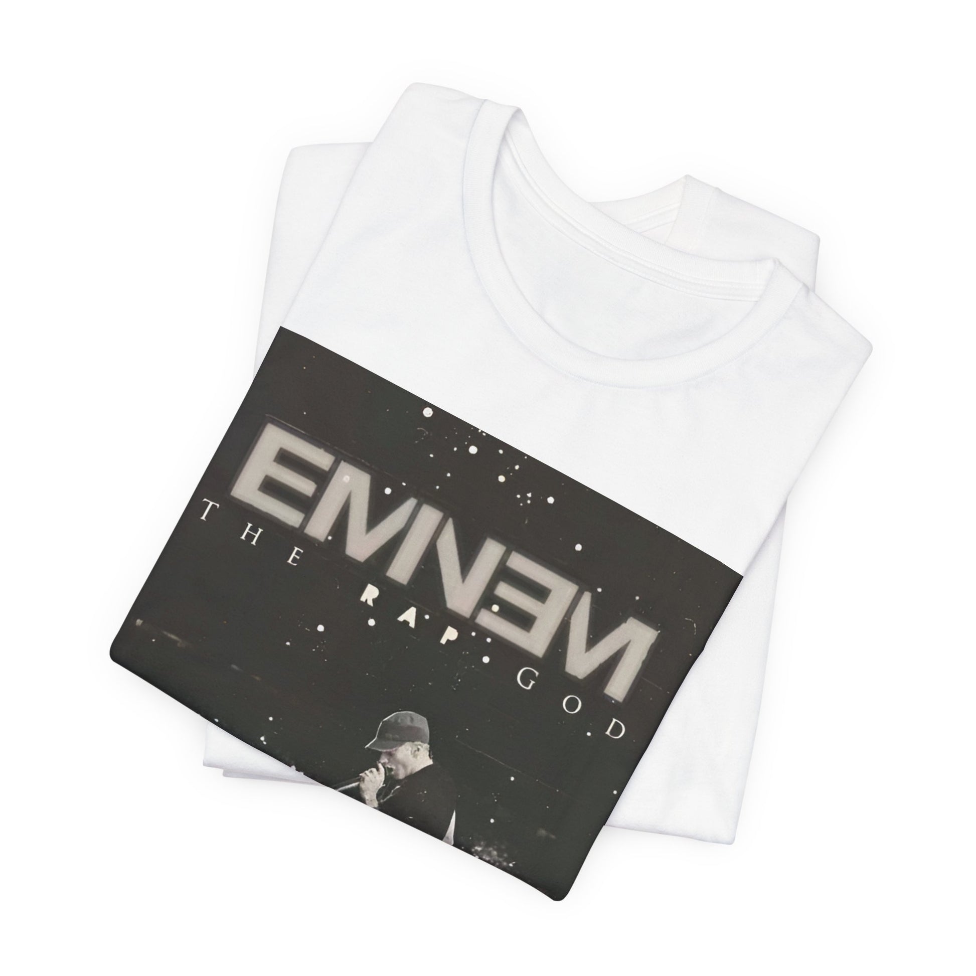 A black graphic t-shirt featuring a graphic or photo of Eminem performing live on tour.