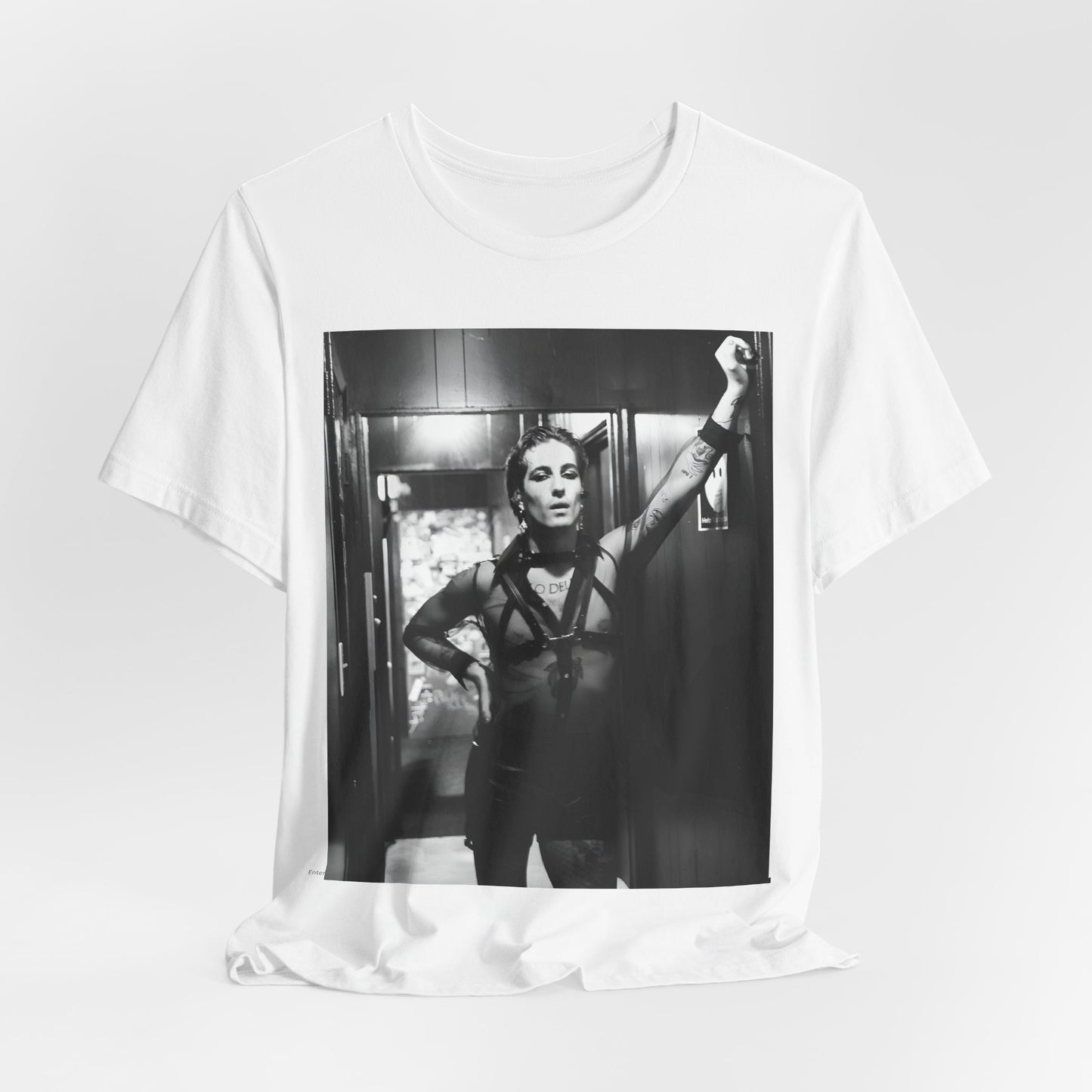 A black graphic t-shirt featuring a graphic of Maneskin emphasizing a rebel rock spirit.